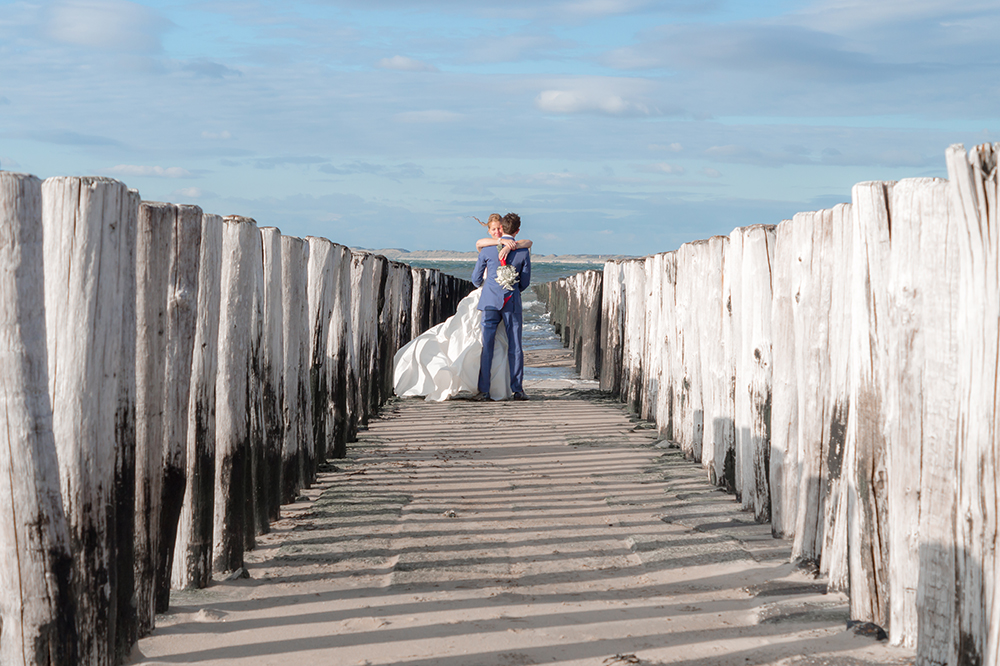 Bruidsreportage huwelijk strand